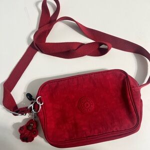 Red Kipling cross body mini bag